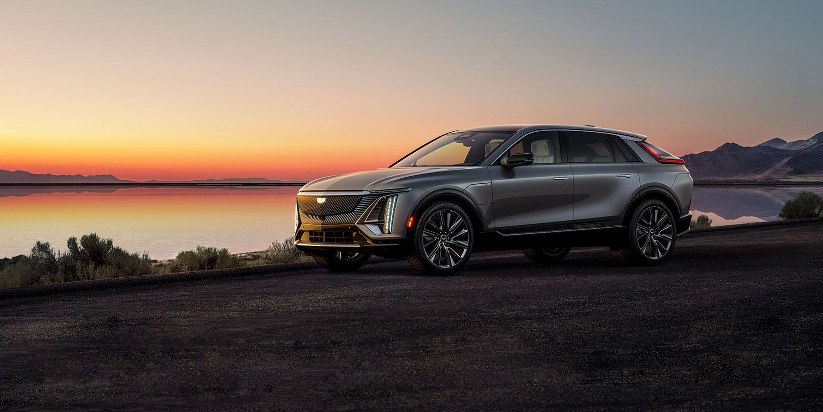 Vehicle parked besides lake